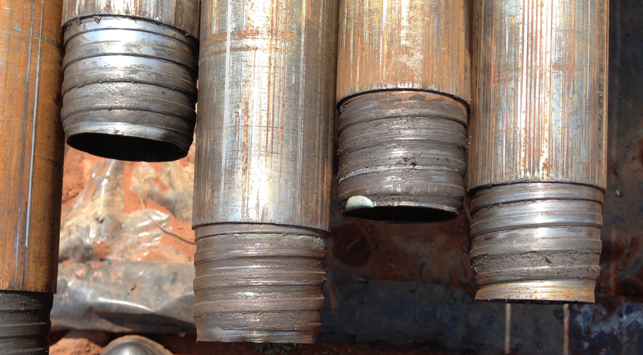 Forces and Stresses in Drill Rods
