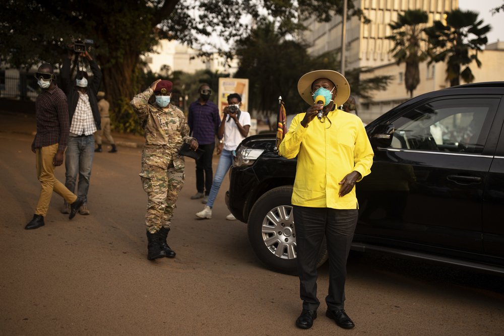  President Yoweri Museveni stops to speak to supporters as he heads back to his residence on January 21, 2021 in Kampala, Uganda. President Yoweri Museveni was declared winner of the elections, with 58% of the ballots cast while Wine had 35%, accordi