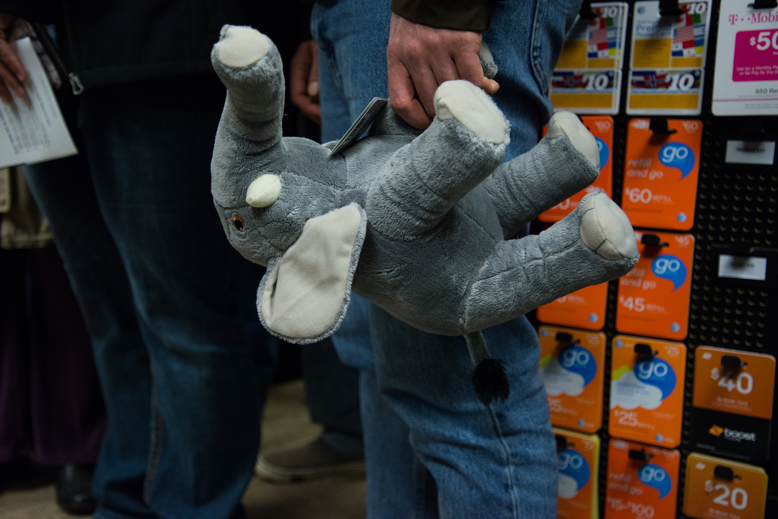  A voter holds a stuffed elephant toy for Republican presidential candidate Ted Cruz to sign at a campaign stop at Casey’s General Store in Chariton, Iowa, on Nov. 28, 2015. 