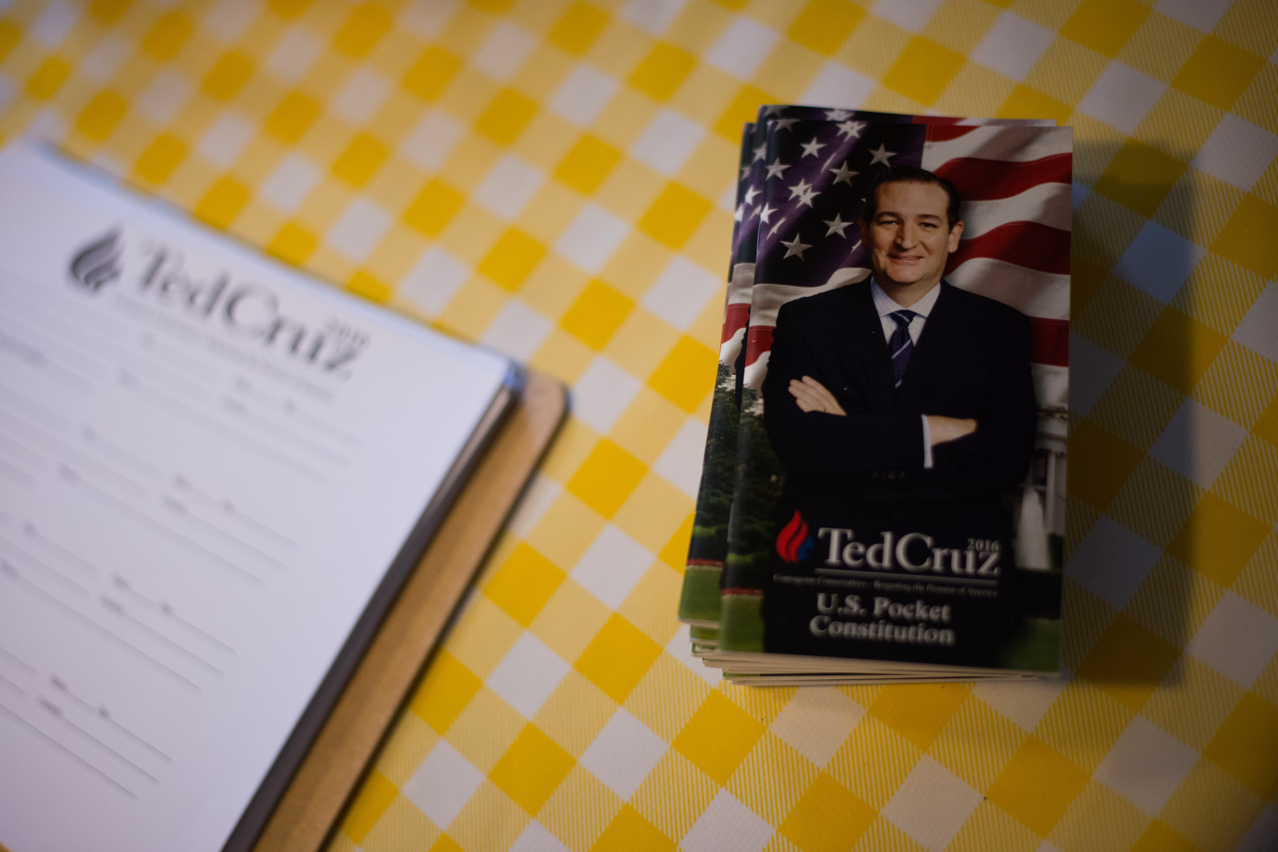  Copies of the United States Constitution handed by the campaign of Republican presidential candidate Ted Cruz sit on a table during a campaign stop at Tiger Den restaurant in Lenox, Iowa, on Nov. 28, 2015. 