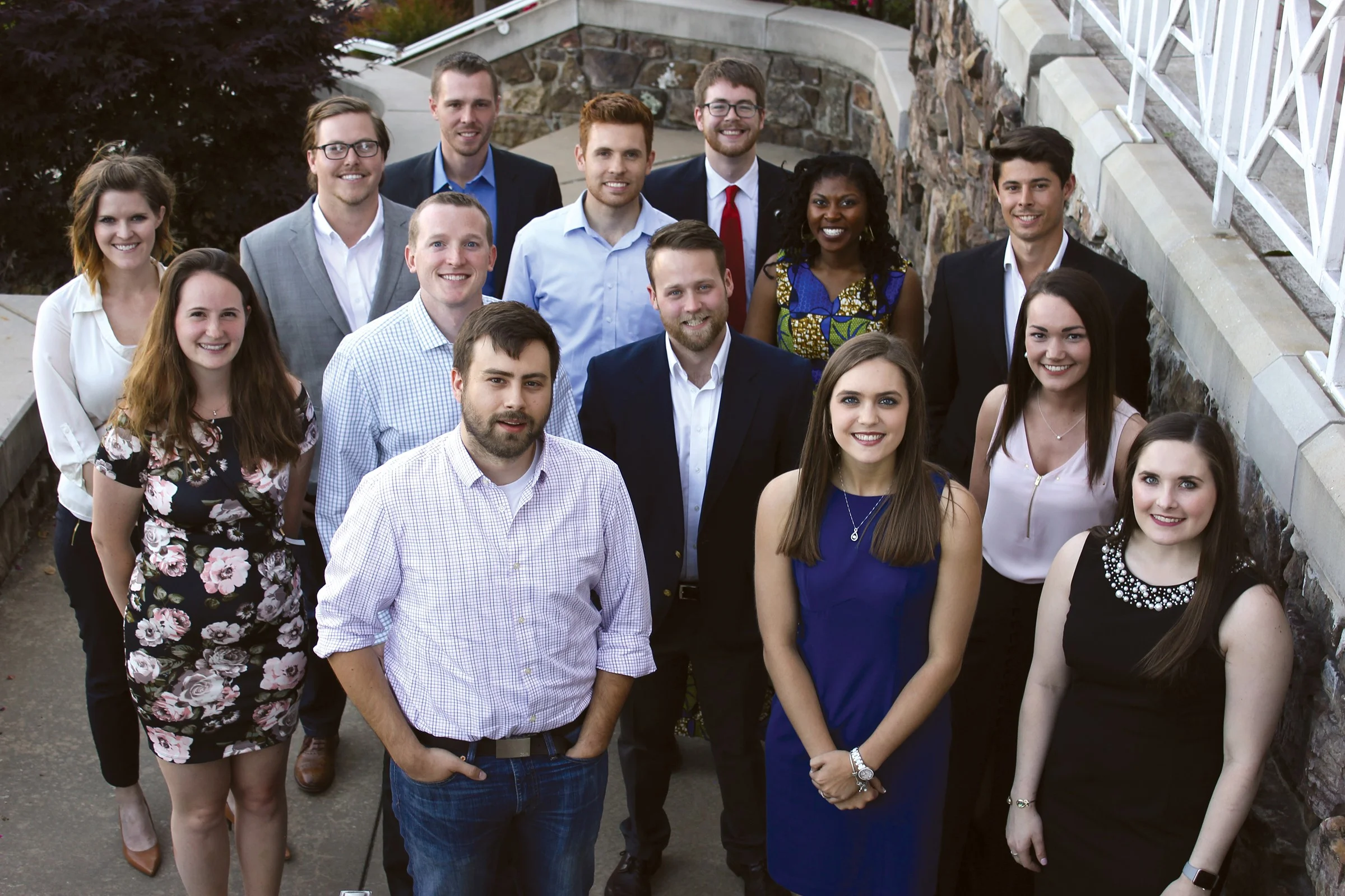 Spencer Jones in gray jacket. Photo courtesy of the Northwest Arkansas Business Journal