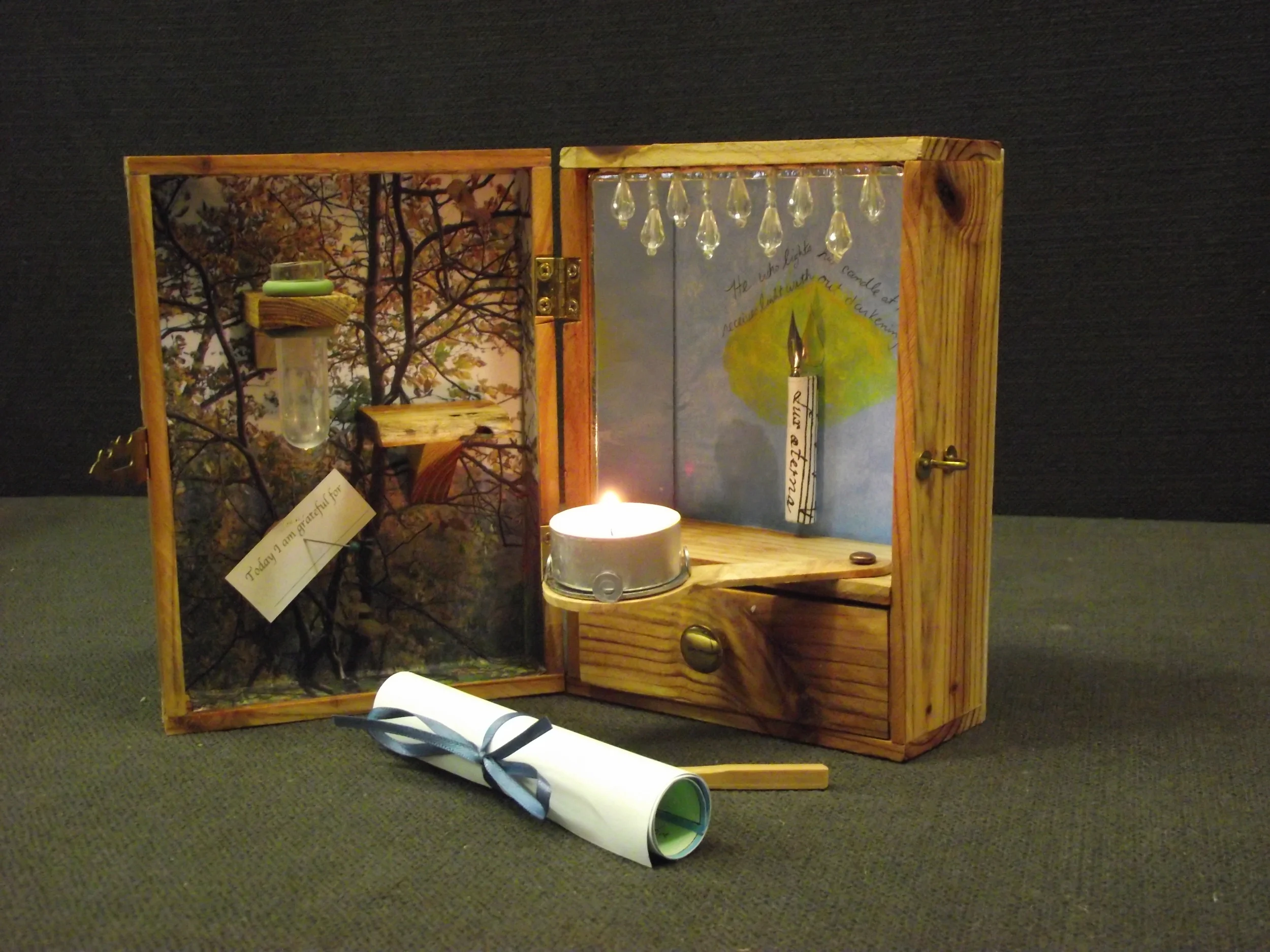 Shrine with lit candle.jpg