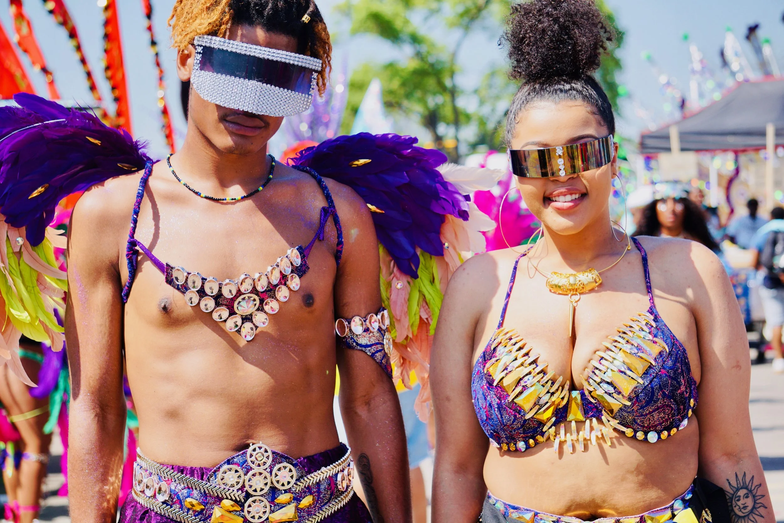 July 3, 2019 (Toronto, Ontario, Canada), Masqueraders enjoying Caribana festivities after participating in the Grande Parade.