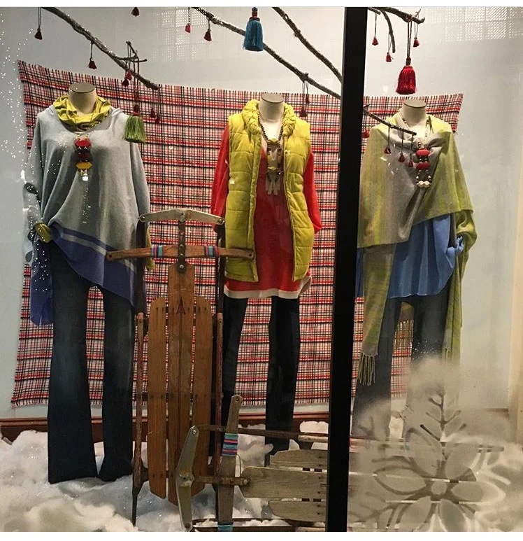 Aquamarine's January 2017 window showing my necklaces on their fantastic clothes! Lewes, Delaware.