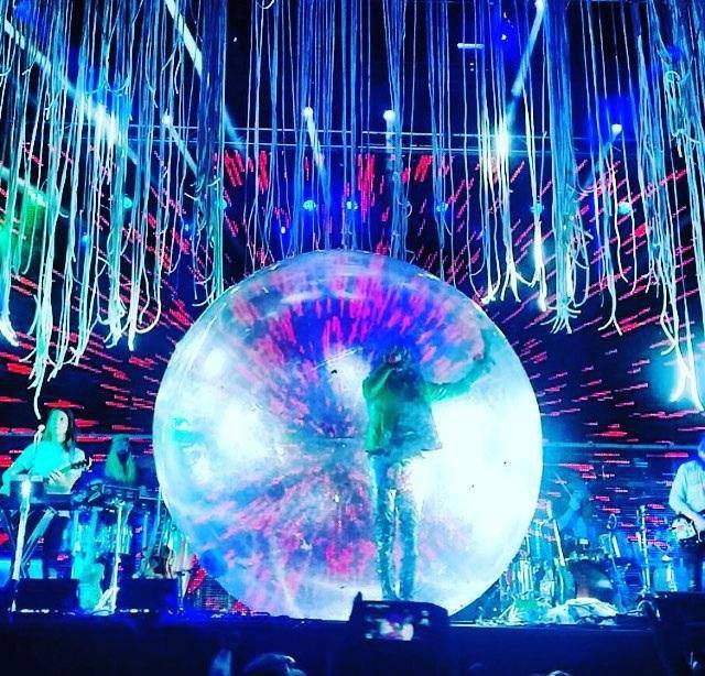 Wayne Coyne within the human-sized hamster ball. Photo courtesy of San Antonio Current. 