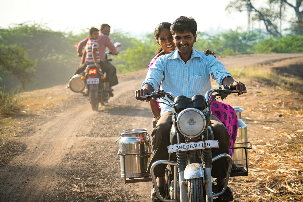 On their way to the milk collection point to drop off that afternoons milk.