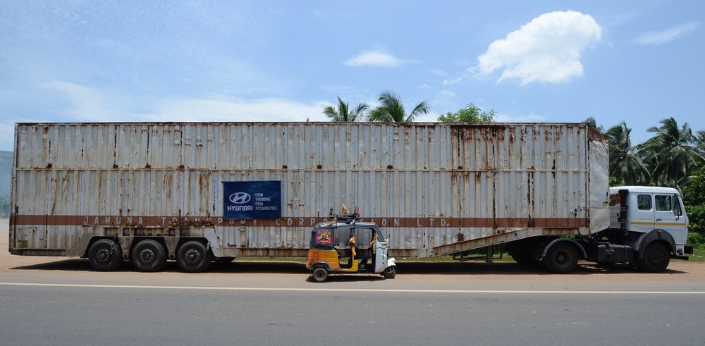 A bit of perspective. Big truck and if you look closely.....our ride.