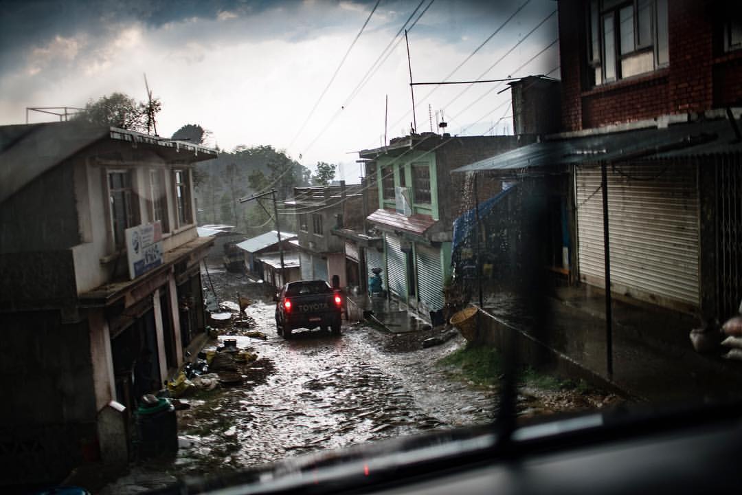 You really have to have a reason to be someplace up in the mountains around Kathmandu. The roads are more like river beds and in the rain that is exactly what they are. I was traveling with doctors from Americares in a raging storm doing follow up visits of patients in remote villages. The roads were terrible, but at least this time I wasn't freaked out about my driver being extremely cross eyed. That is another story from a previous trip into the mountains