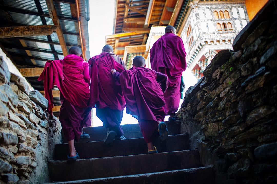 Young monks traveling in packs at a Monastery in Bhutan. I led a photo workshop with @cameravoyages to Bhutan/Nepal. I was part den mother, teacher, cat herder, guide, doctor, storyteller, and therapist. Taking people to experience the world the way I do when on assignment is a pleasure and a privilege.