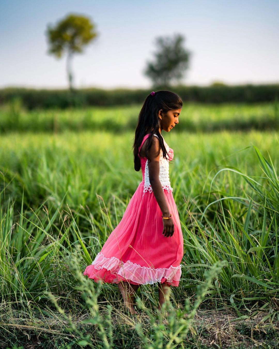 I spent a couple of days with a family documenting their day to day work. She wanted to wear her favorite dress during the entire shoot. I enquired about a sari and was given a face of "no way". They let us disrupt their day and did whatever was asked. Beautiful people through and through and I appreciate the openness and effort in their part.