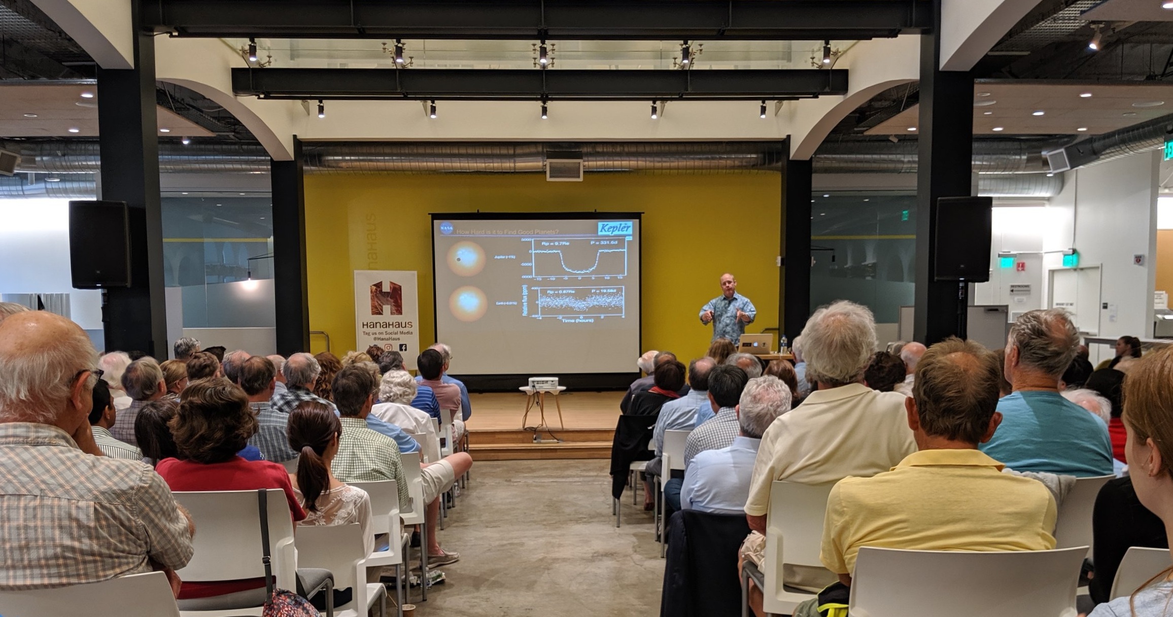 Dr. Jon M. Jenkins on our HanaHaus stage describing how Kepler measures the dip in brightness of stars when a planet crosses in front of it.