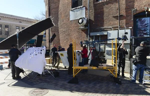 The set of a movie in the east alley near Third Avenue in downtown Longmont on Tuesday. (Lewis Geyer / Longmont Times-Call)
