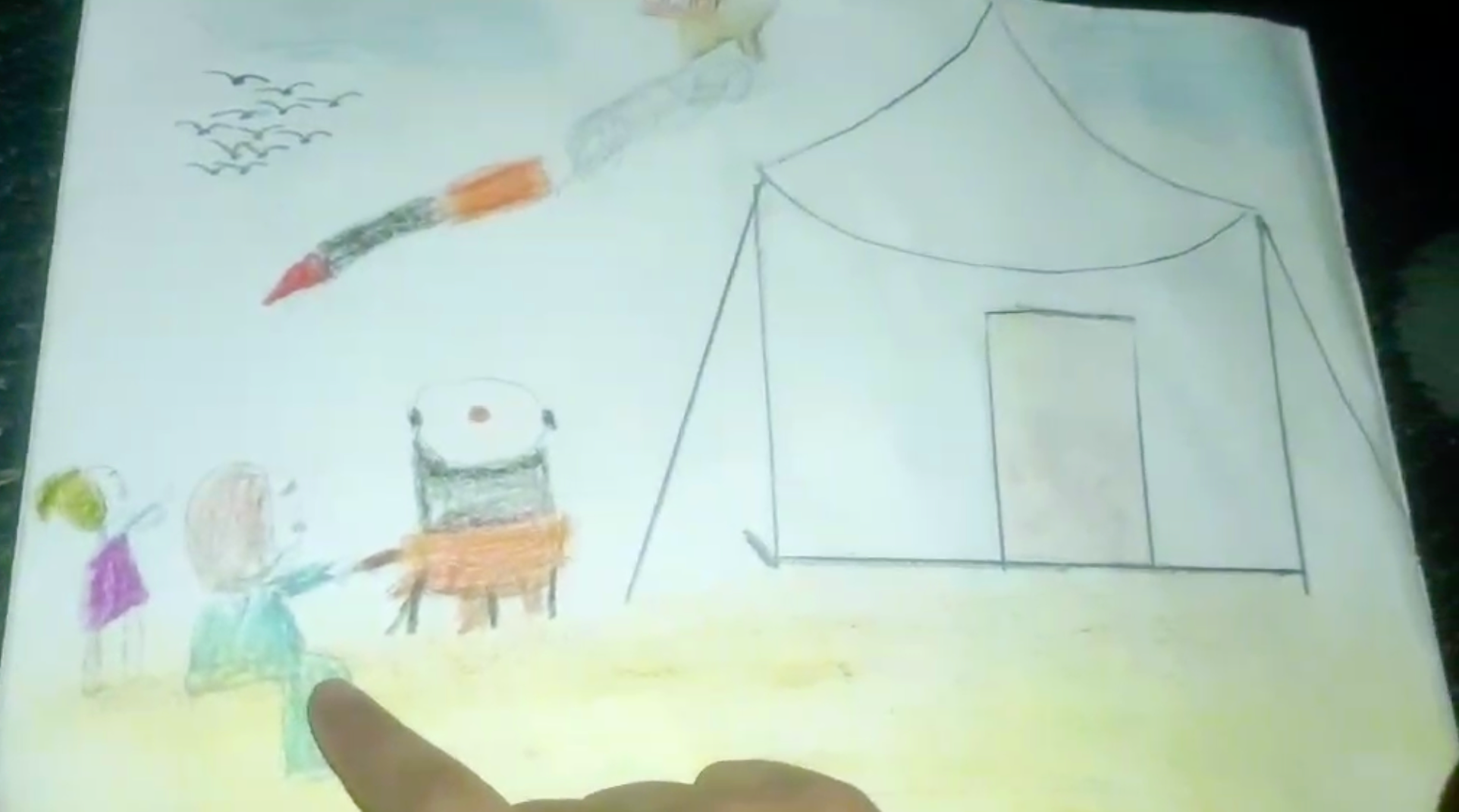 “A mother is cooking. Her daughter tries to warn her that a missile is coming.”