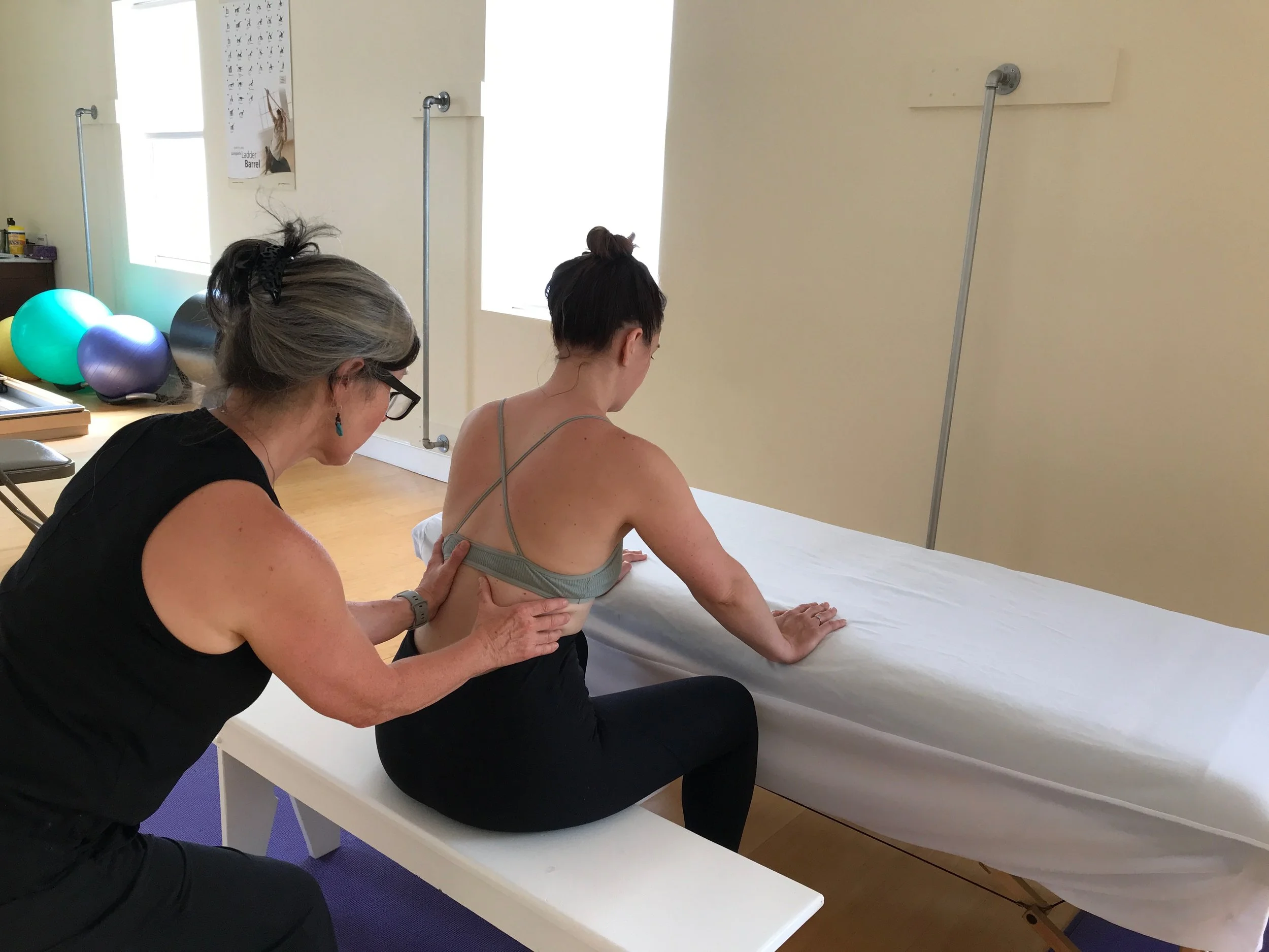 seated touch cuing.jpeg