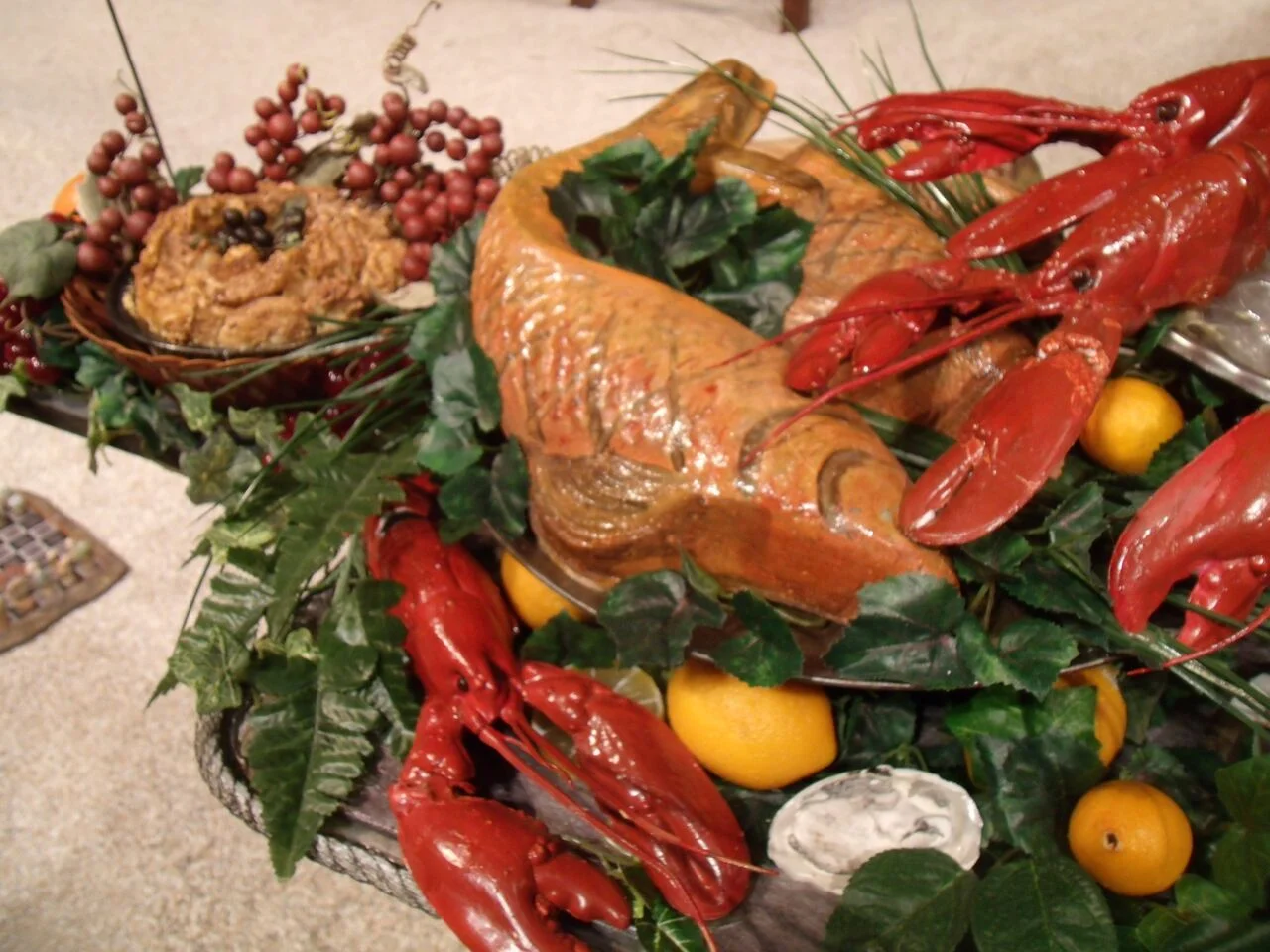 Banquet for The Tempest. Made from expanding foam, plastic lobsters, plastic lemons, fabric greenery, and acrylic paint. Collaborative Effort.