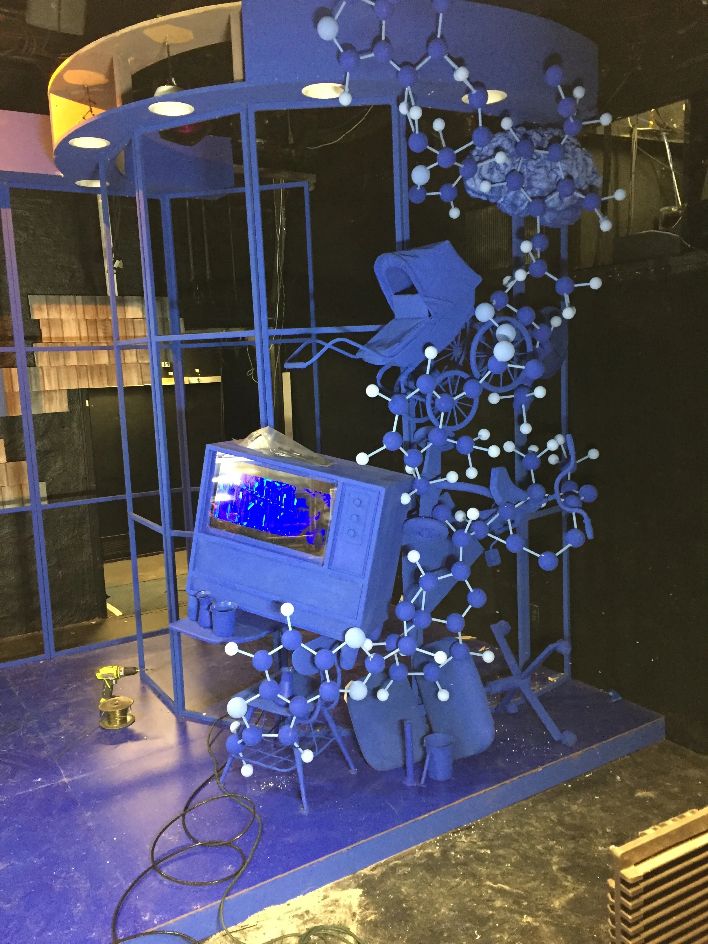 Molecule Sculpture for The Other Place . Made with foam, dowel rods, zip ties, hot glue, box steel Collaborative Effort.