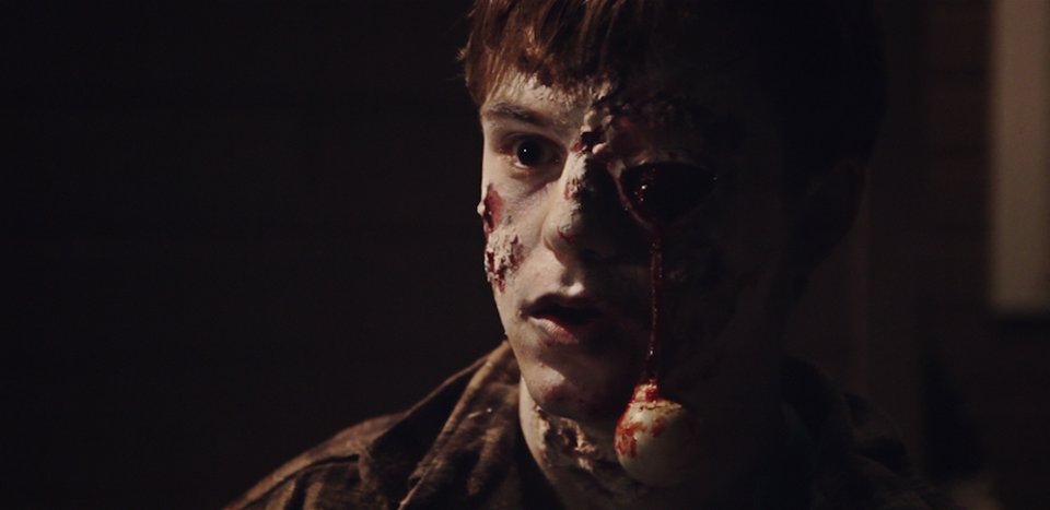 Zombie for A New Infection : gelatin, latex, cotton balls, a ping pong ball, grease makeup and stage blood. 