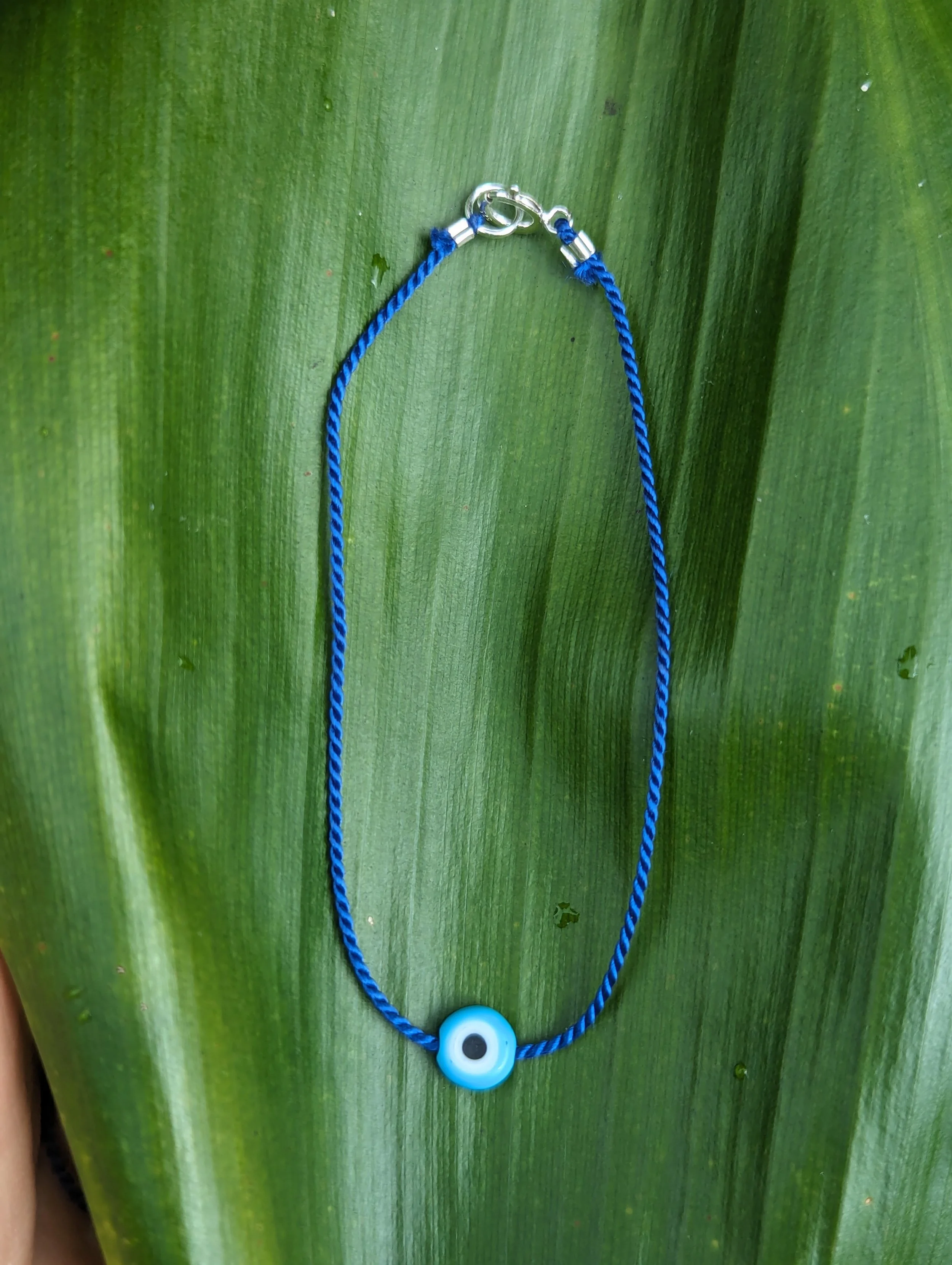 light blue bead bracelet.jpg