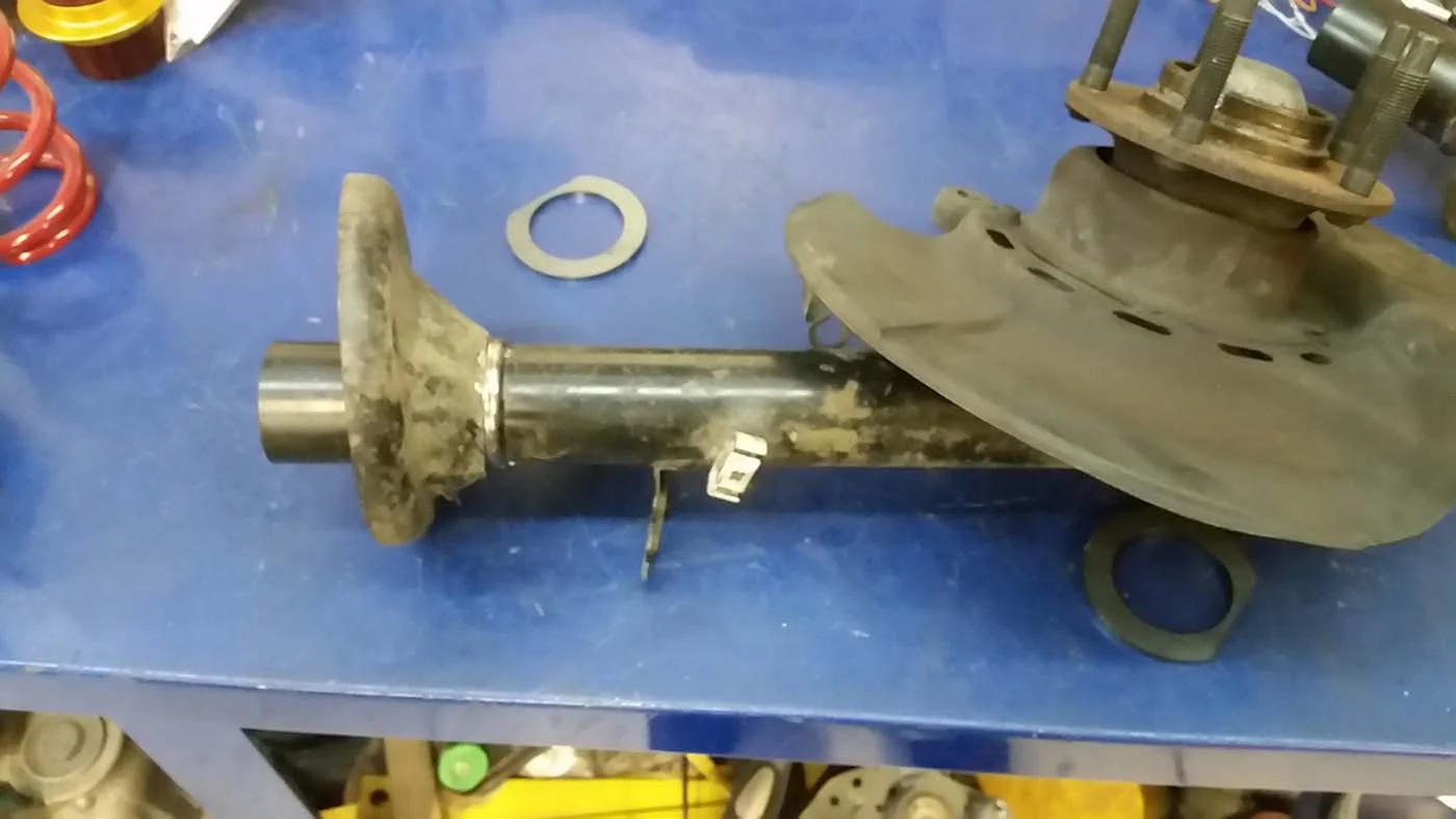 Factory strut ready for modification