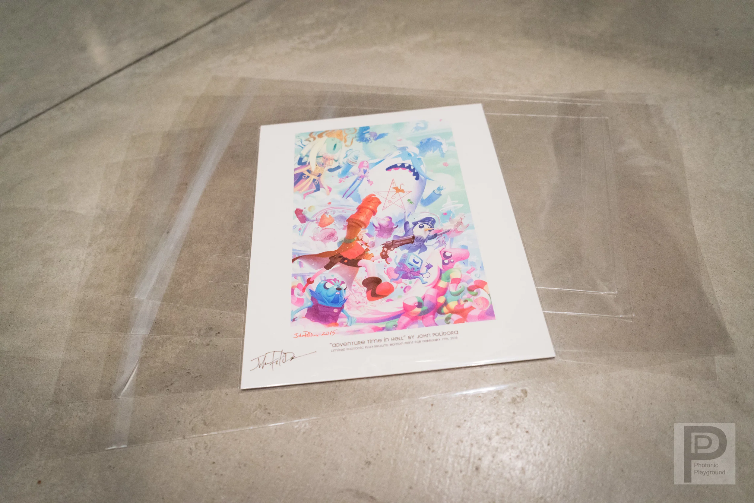    Plastic sleeves to protect your print against the elements and finger prints. The adhesive is on the sleeve, not on the flap so your print stays clean in and out. From  5x7"  to  17x22" .  This 8.5x11" print by John Polidora is being protected by a sleeve. This giclée art piece is  John Polidora  from the  February/March 2015 Photonic Playground  art show.