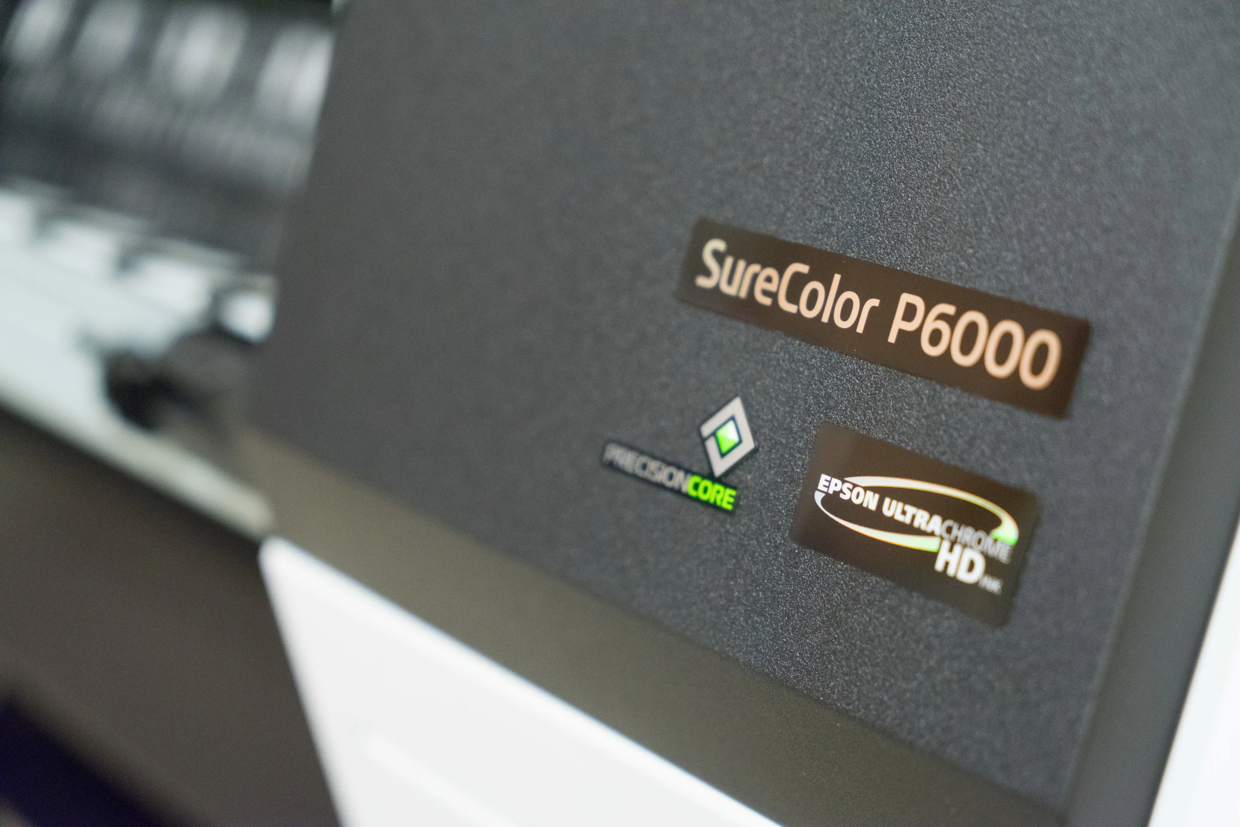 Our large format printer by Epson, the SureColor P6000 capable of 24" wide borderless printing using a color precise 9 ink system for beautiful gradations.