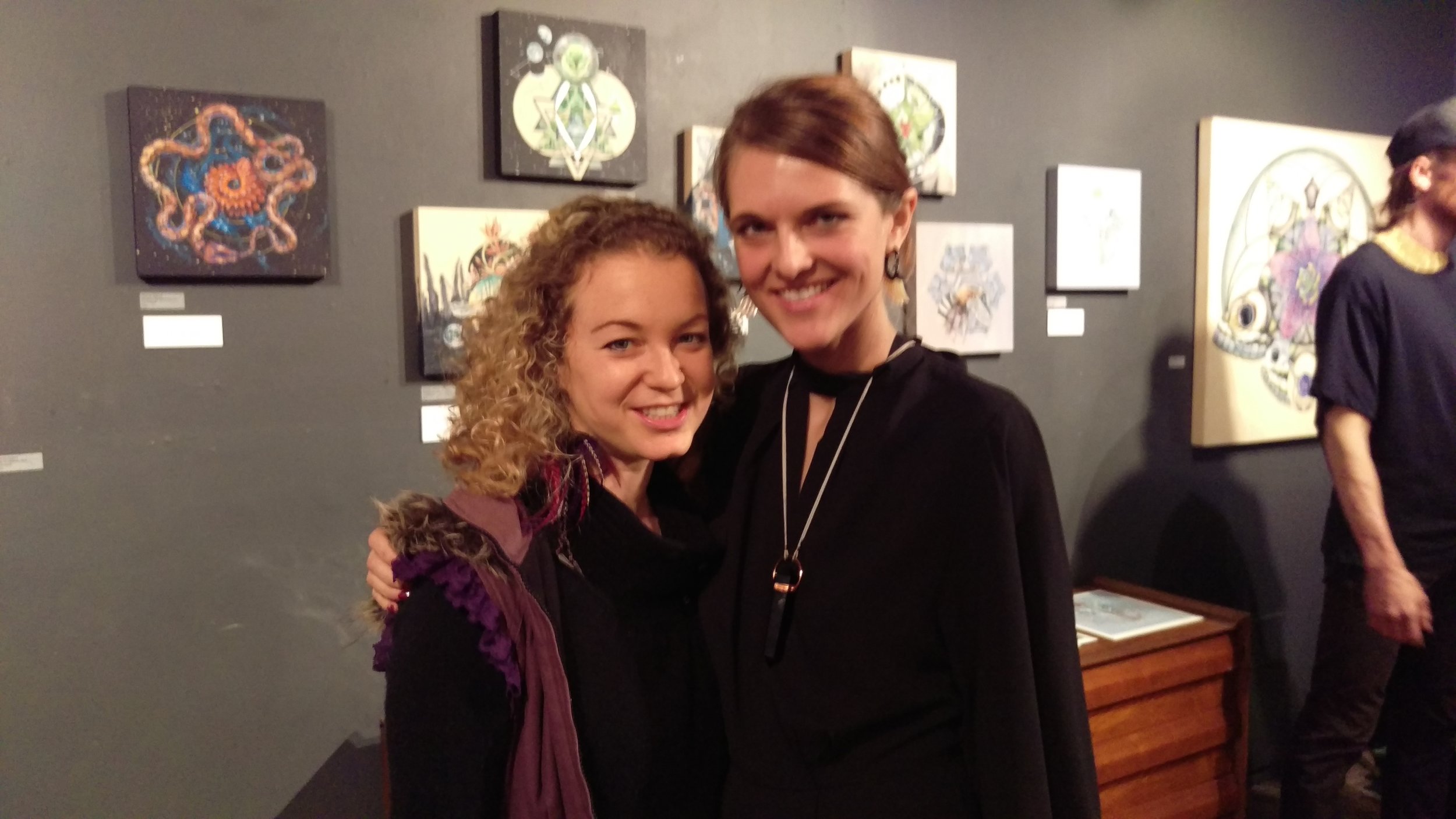 Too bad this is blurry. Michelle's art on the walls behind us is ridiculously amazing. Please visit her site to check it out!
