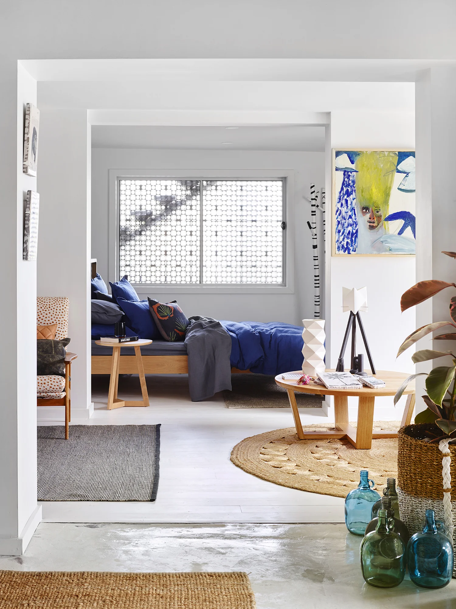 Spencer's original artwork adorning the walls of beautiful Brisbane home wares store Kira and Kira . Photography Toby Scott .