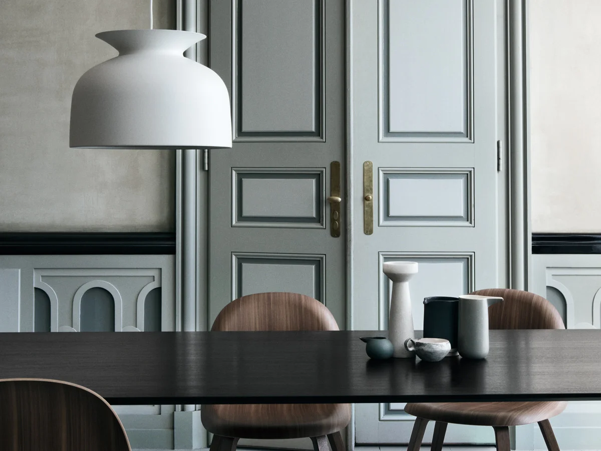 'Gubi Ronde' pendant available through Surrouding makes a bold statement in a large room.