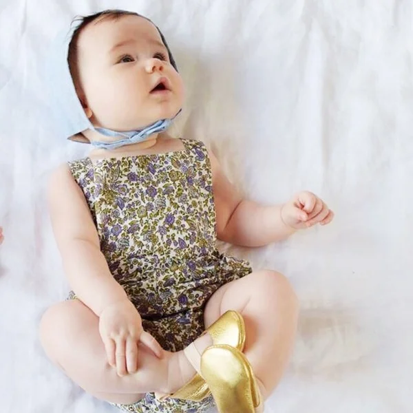 Lilac linen romper in a whimsical floral print and GOLD metallic ballet moccs .