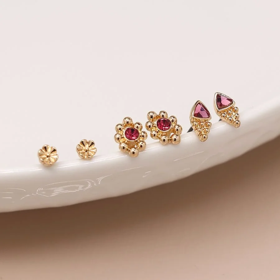 Faux gold plated triple stud set with pink crystal