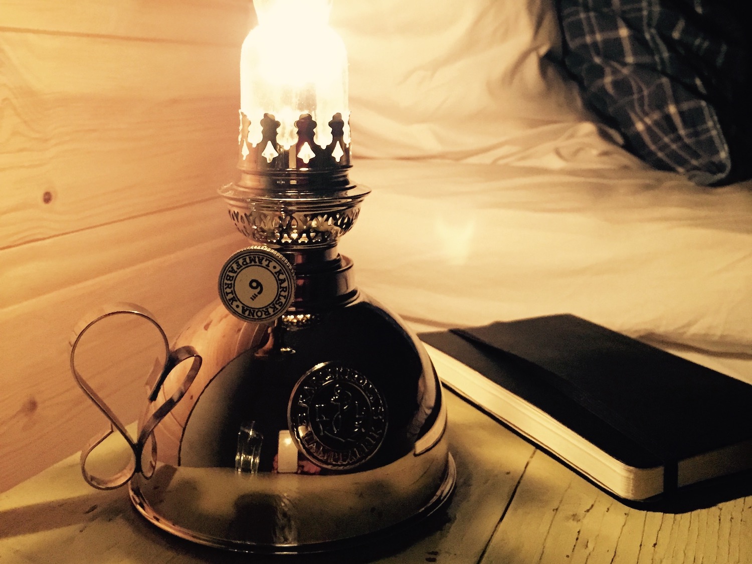 NordicLife interior - bedroom with traditional oil lamp from Karlskrona