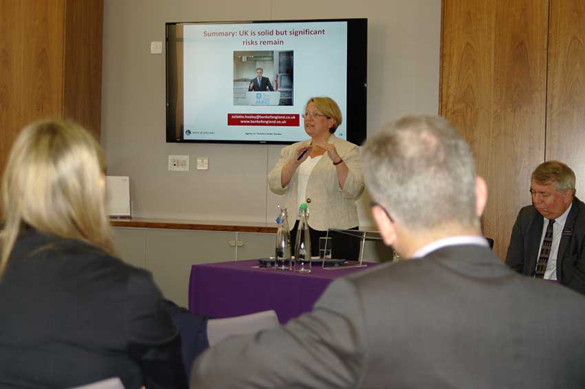 Juliette Healey presenting the Bank's outlook