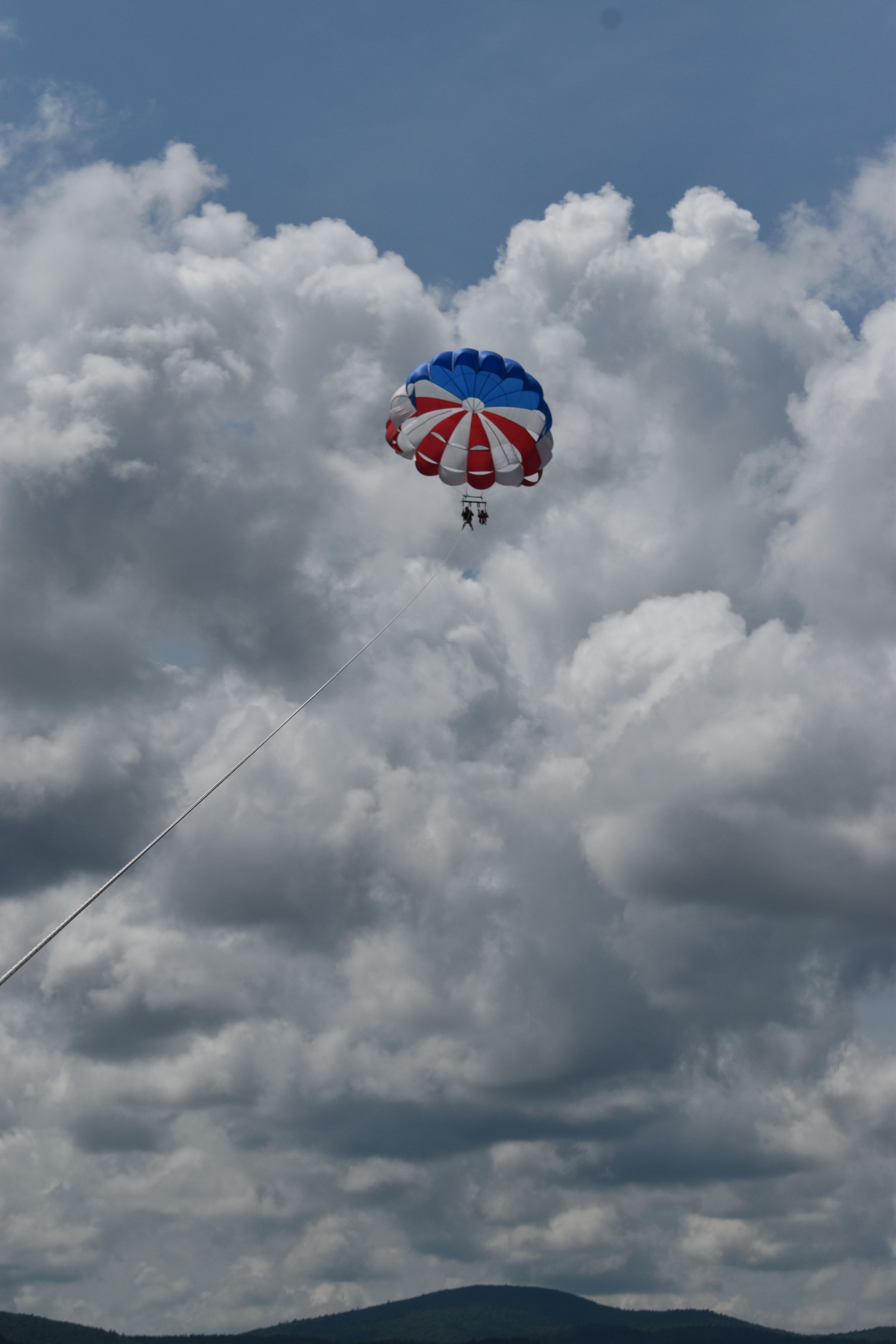 ParasailingChristinaTracyinCloudsFarther.jpeg