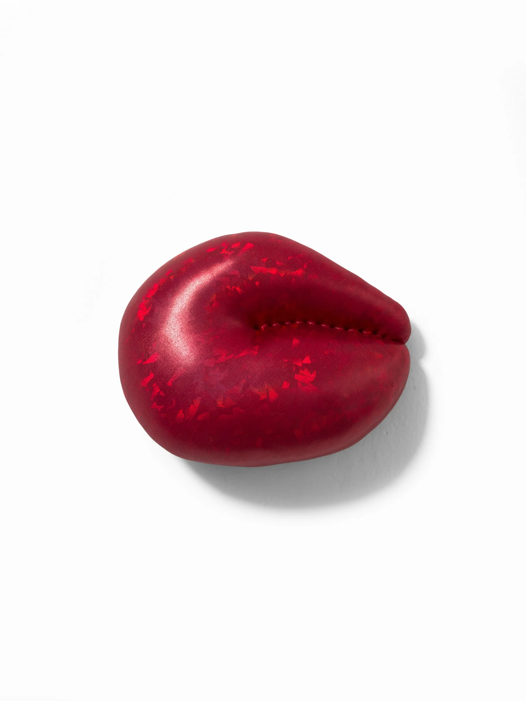 it was already love  2025 Fabric and stuffing on custom shaped wood panel. 6 x 8 x 3 in.