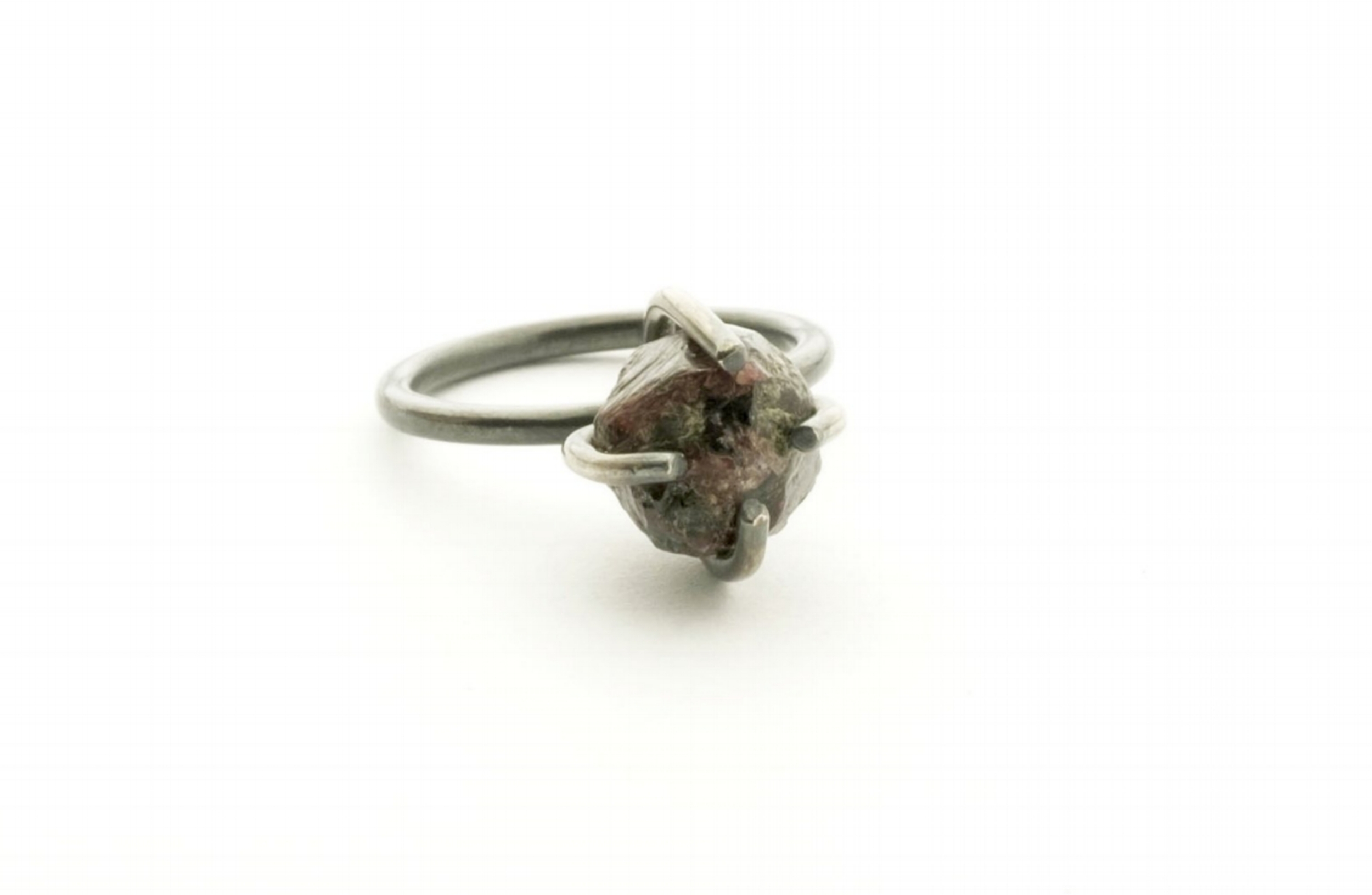 Oxidised Claw ring in silver with raw ruby garnet