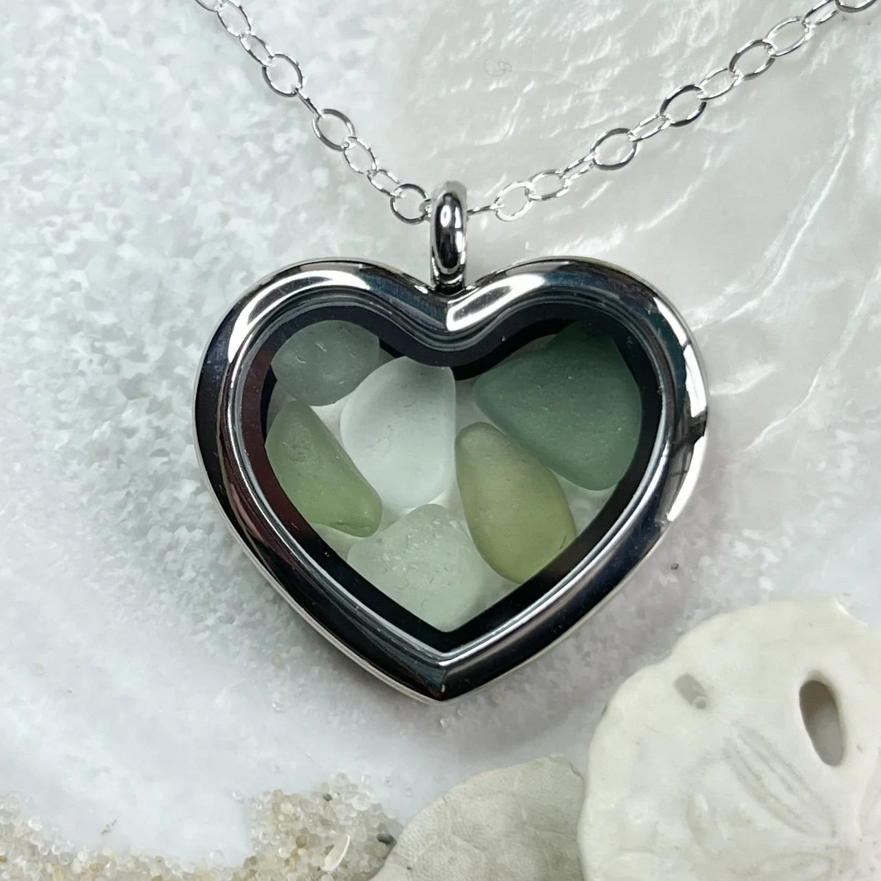 Glass Heart Locket Filled with Shades of Green Sea Glass  by Janet Payne Jewelry, Cape May, NJ.jpg