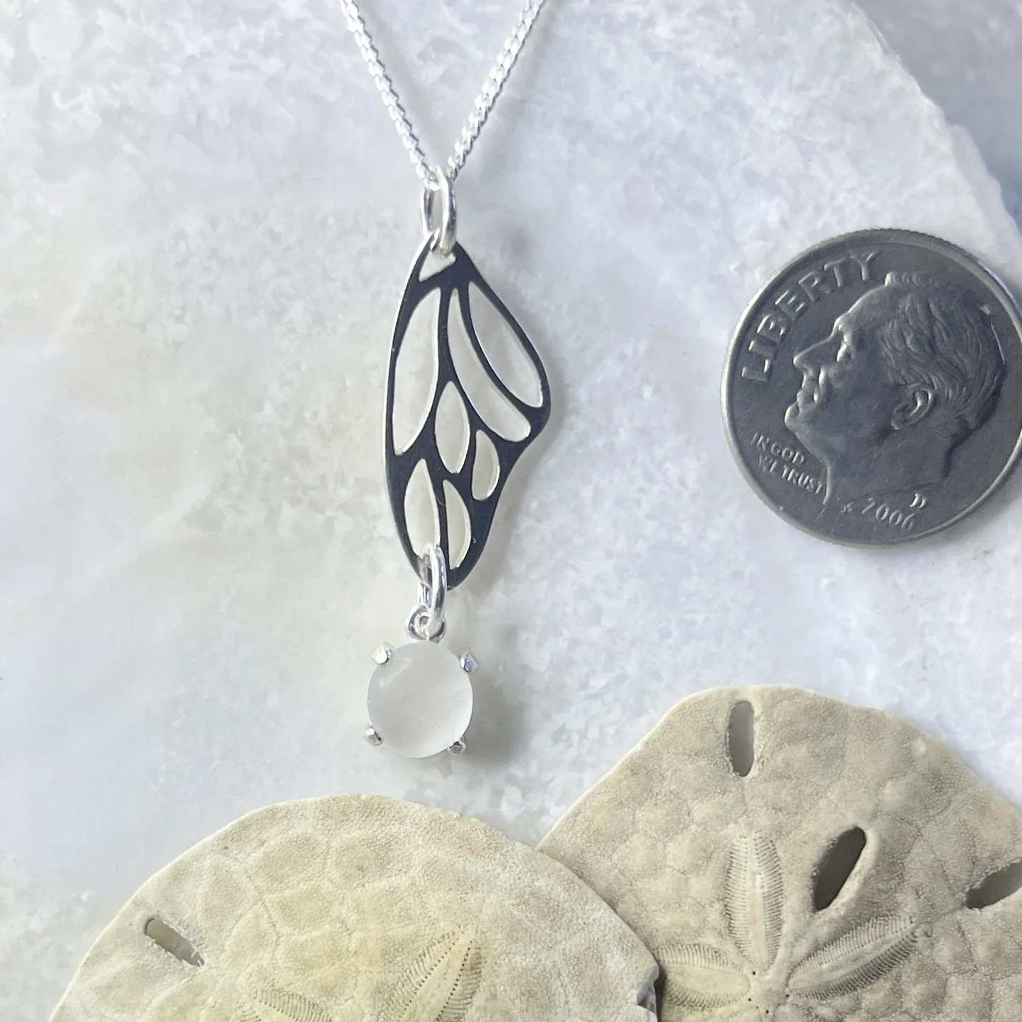 Sterling Silver Butterfly Wing Necklace with a Cape May Diamond Drop