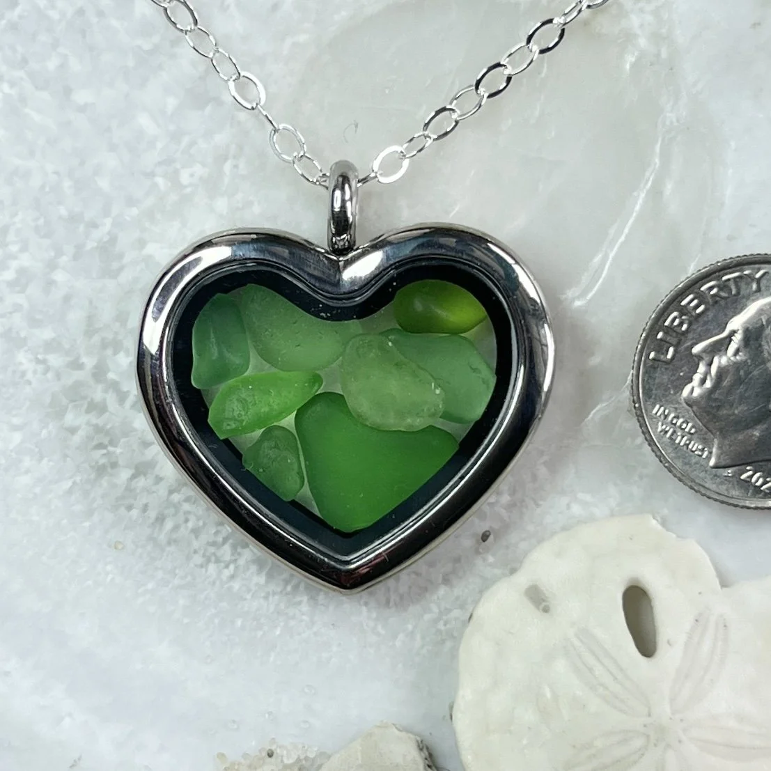 Glass Heart Locket Filled with Green Sea Glass.jpg