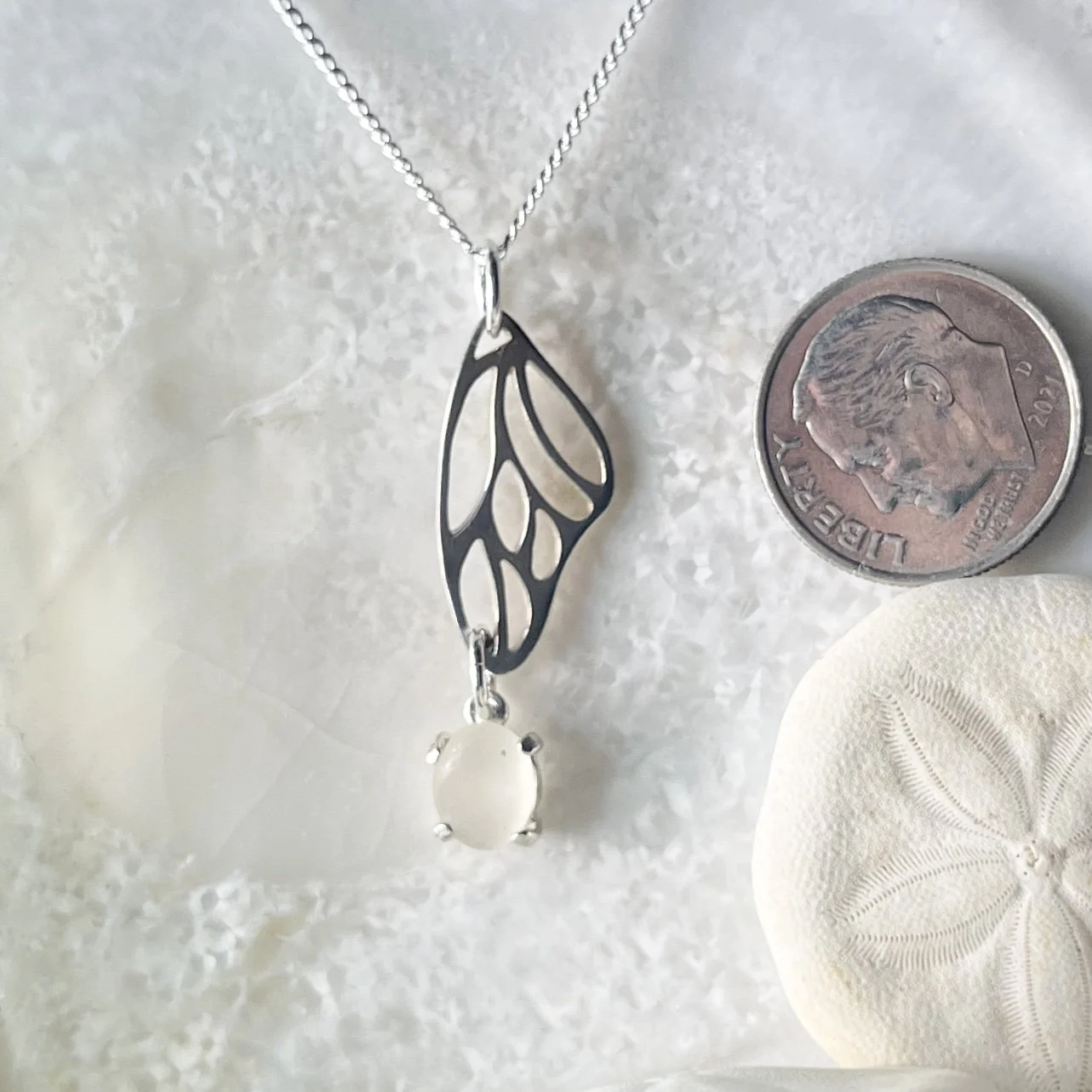 Sterling Silver Butterfly Wing Necklace with a Cape May Diamond Drop