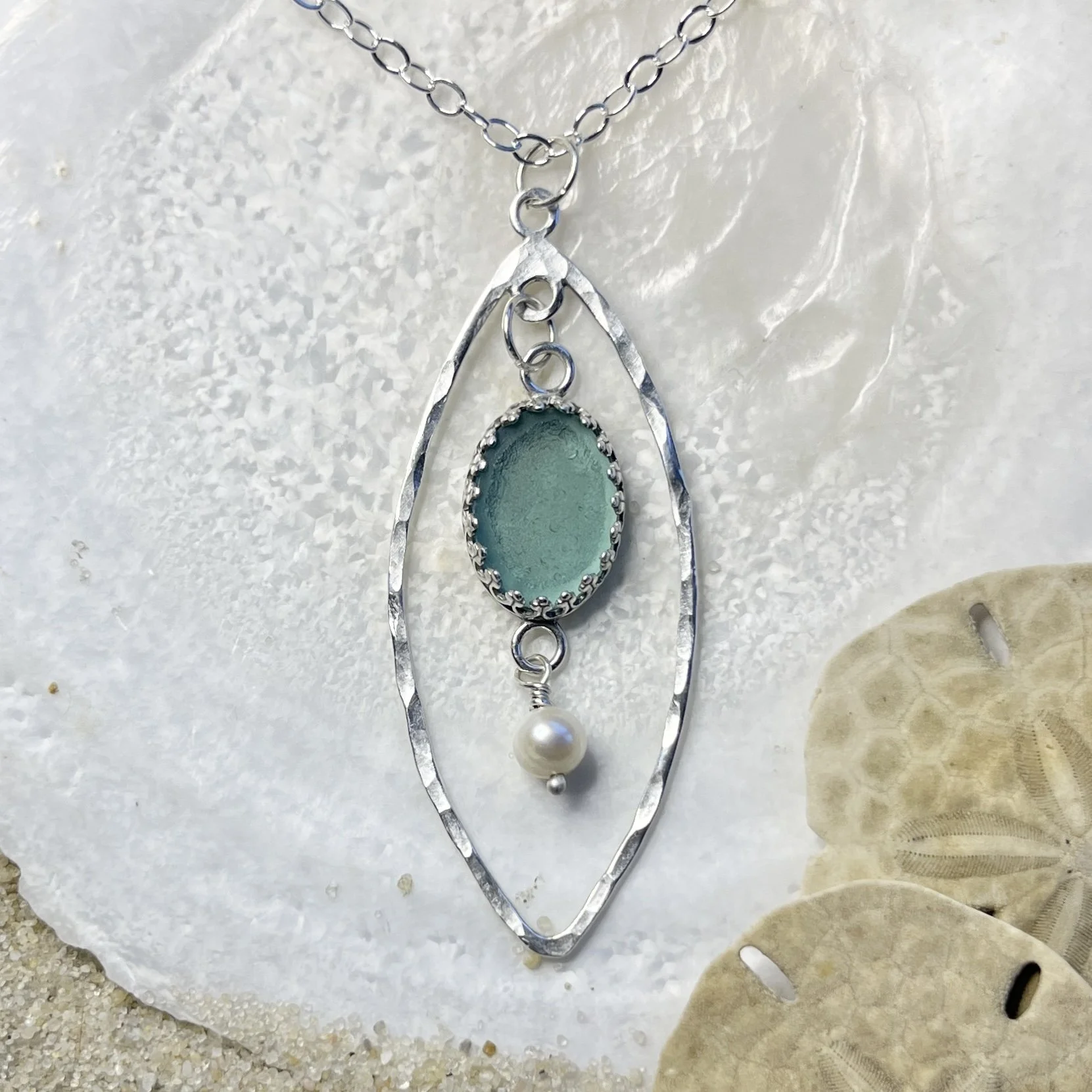 Light teal Sea Glass Pendant with a Fresh Water Pearl in a Sterling Silver Frame by Janet Payne Jewelry, Cape May, NJ.jpg