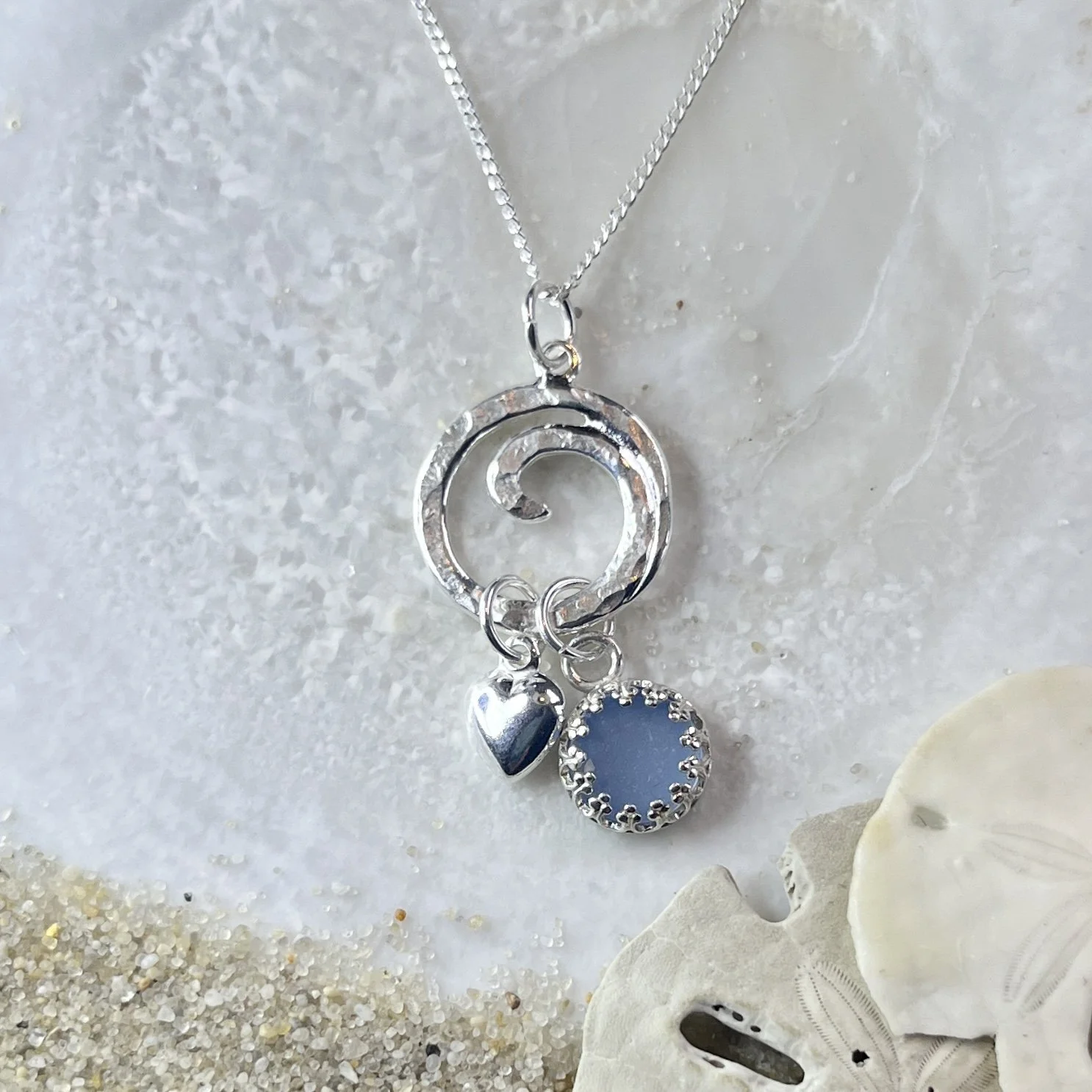 Sterling Silver Ocean Wave Necklace with Petite Cornflower Blue Sea Glass and a Sterling Silver Heart .jpg