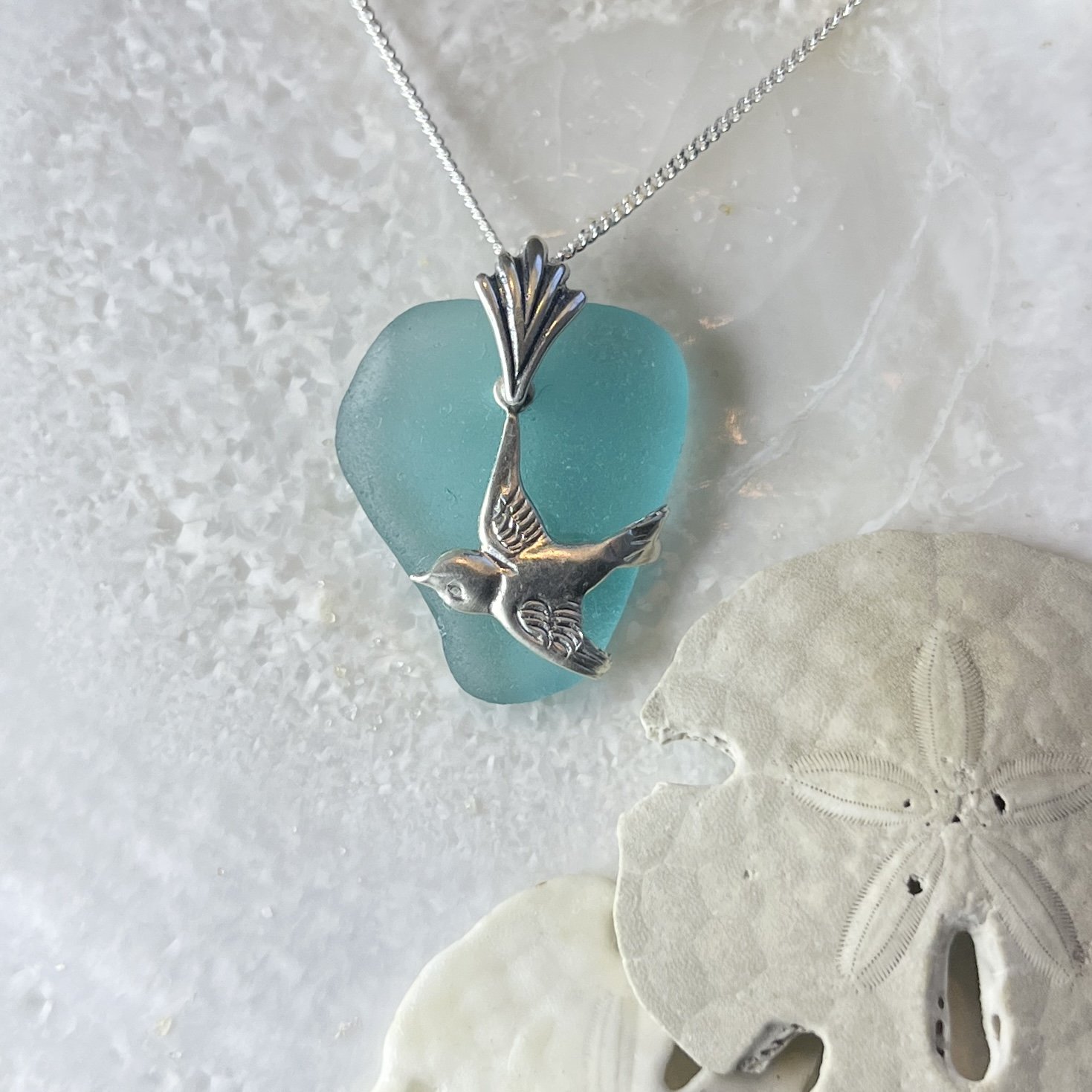 Teal Sea Glass Necklace with a Sterling Silver Bird by Janet Payne Jewelry, Cape May, NJ