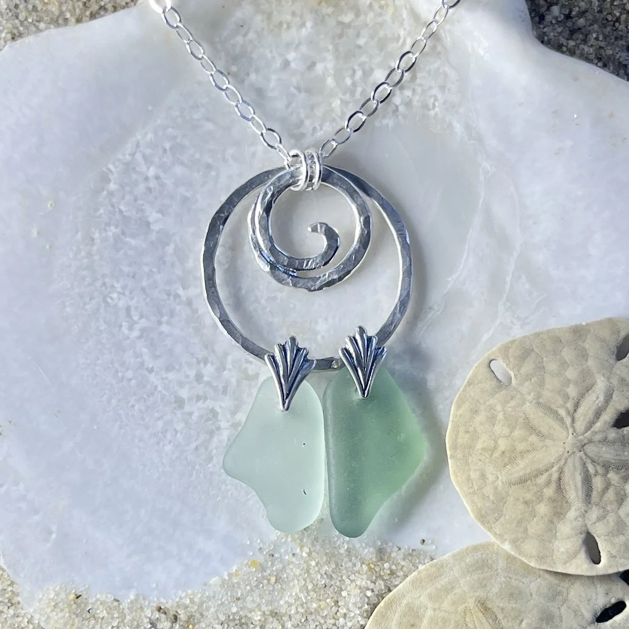 Necklace with Sterling Silver Circle, an Ocean Wave and Two Pieces of Seafoam by Janet Payne Jewelry, Cape May, NJ