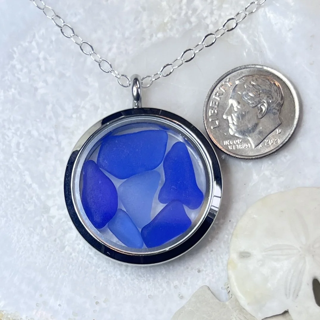 Glass Circle Locket Filled with Shades of Blue Sea Glass.jpg