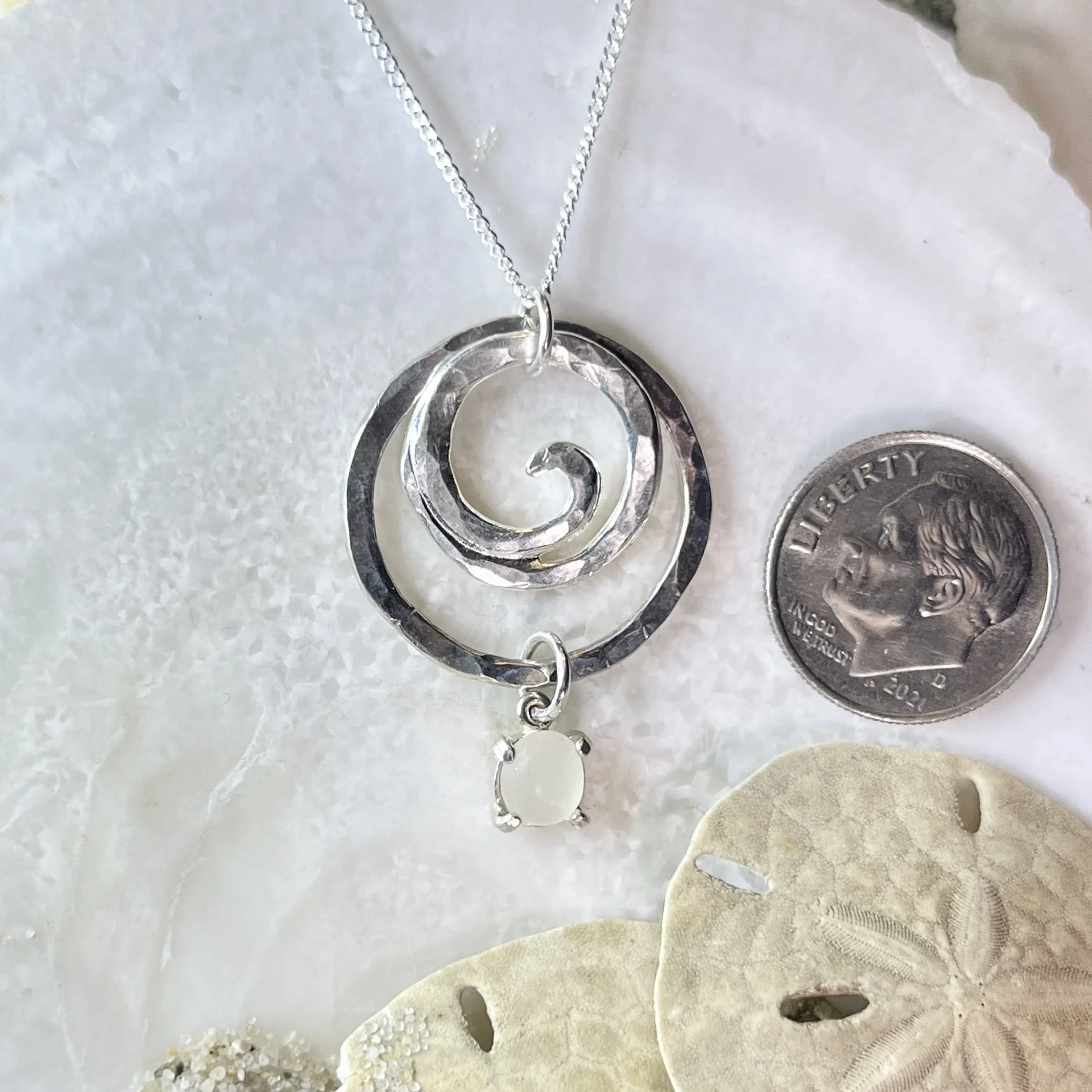 Sterling Silver Wave within a Sterling Silver Circle with Cape May Diamond Drop