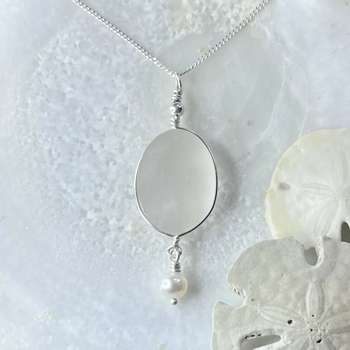 Large Cape May Diamond necklace set in a simple wire bezel with a freshwater pearl drop by Janet Payne Jewelry, Cape May, NJ