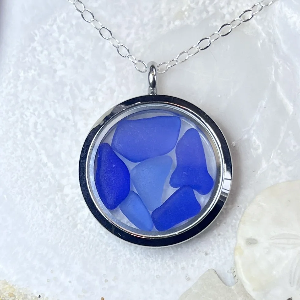 Glass Circle Locket Filled with Shades of Blue Sea Glass by Janet Payne Jewelry, Cape May, NJ.jpg