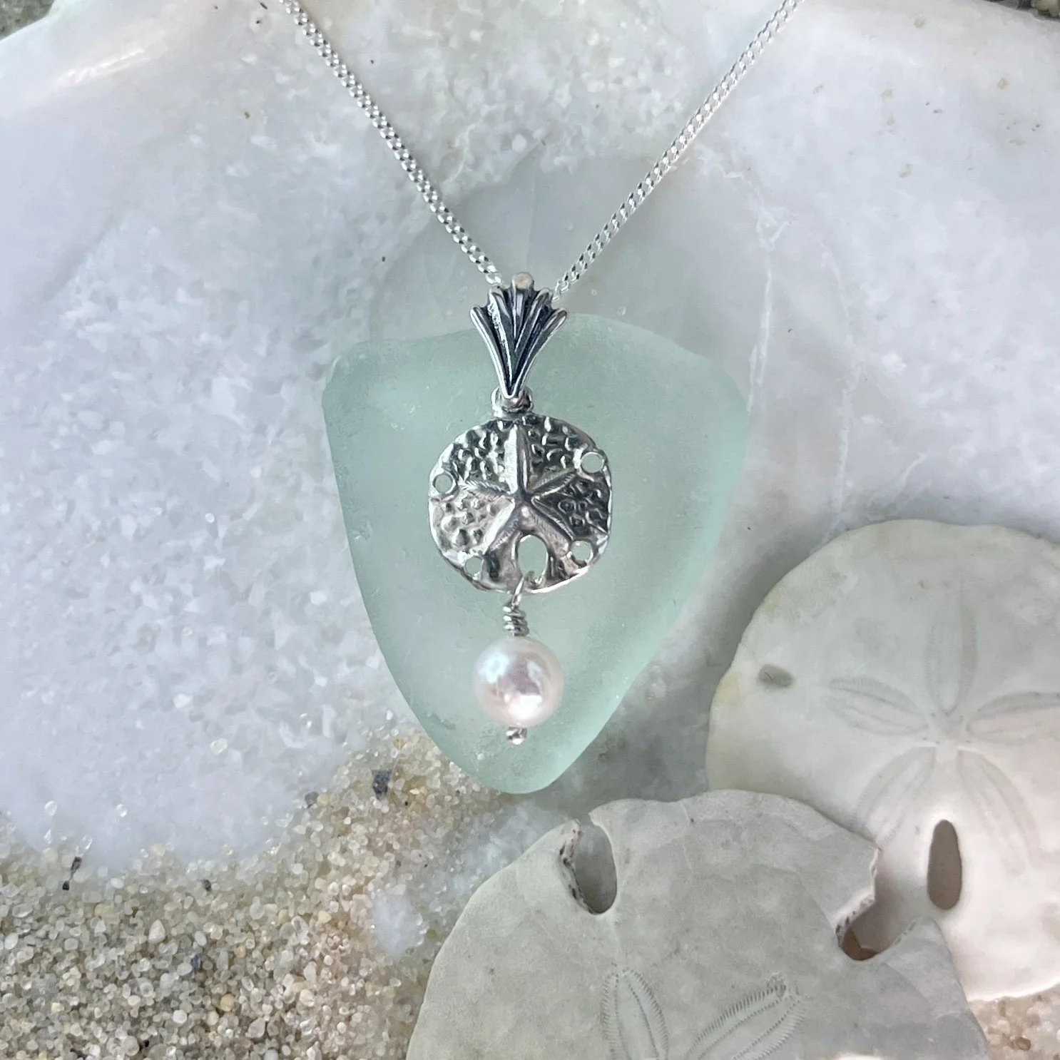 Green Seafoam Sea Glass with a Sterling Silver Sand Dollar and a Freshwater Pearl by Janet Pyne Jewelry, Cape May, NJ
