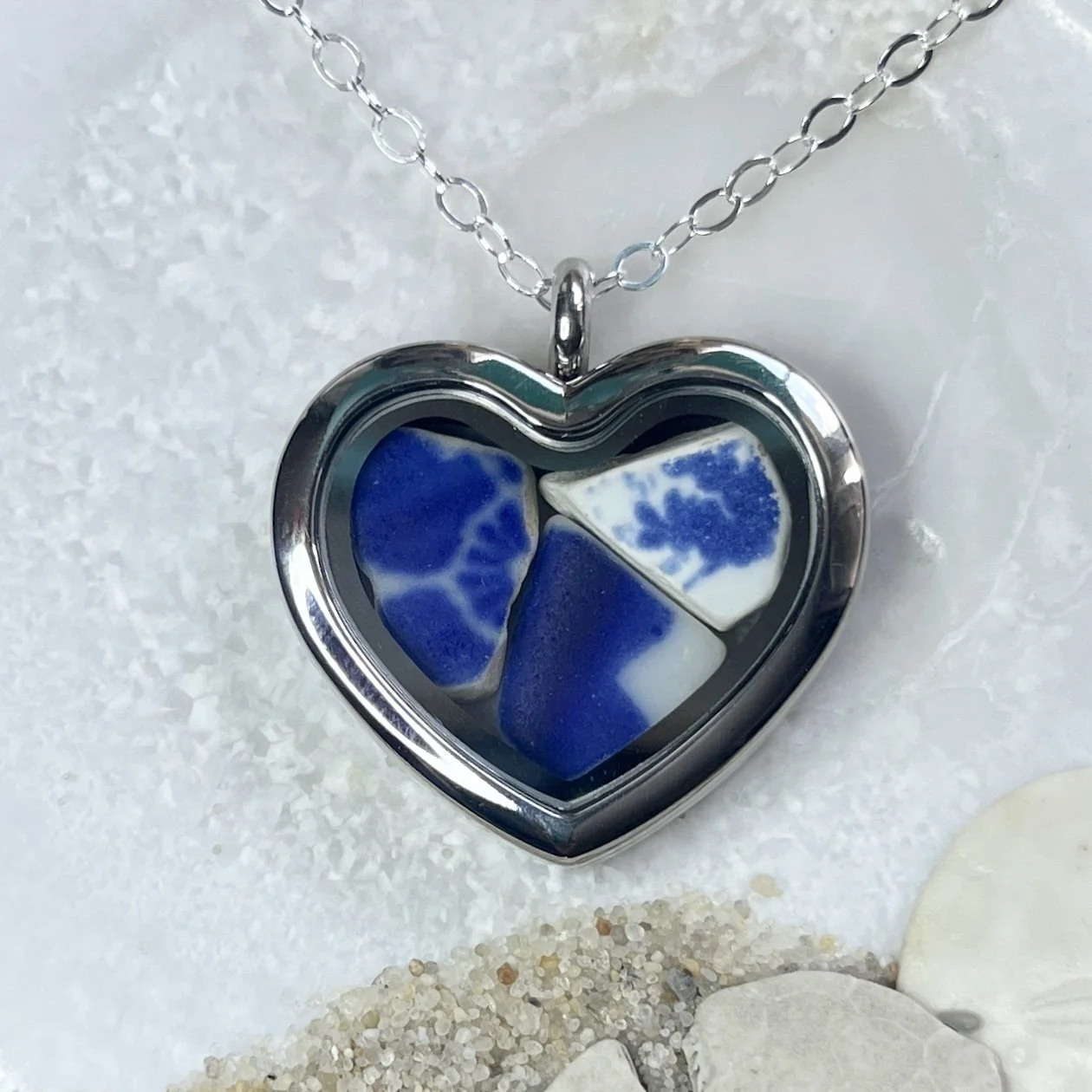 Glass Heart Locket Filled with Blue and White Sea Pottery by Janet Payne Jewelry, Cape May, NJ.jpg