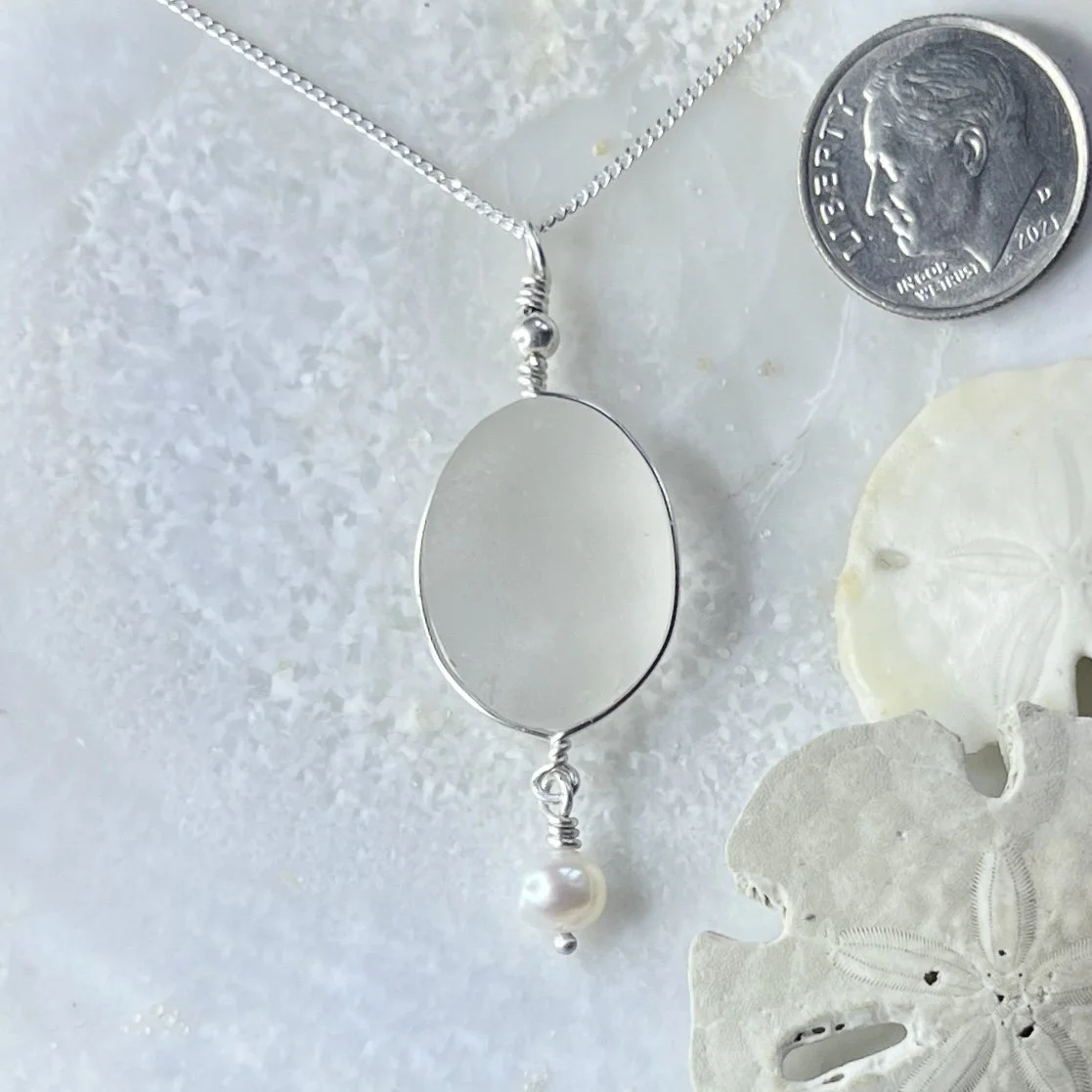 Large Cape May Diamond necklace set in a simple wire bezel with a freshwater pearl drop by Janet Payne Jewelry, Cape May, NJ